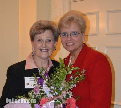 Annette Barfield recieves award from Tammy Gilland, Vice President of the Athens Regional Foundation. Photo courtesy Athens-Banner Herald. 